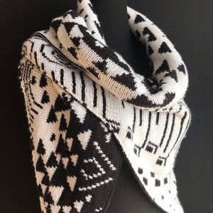 Double knitted reversible shawl.